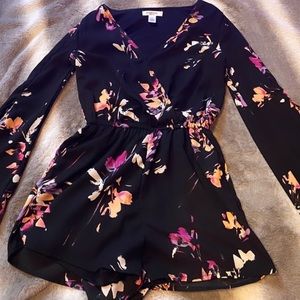 Black romper with flower print